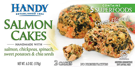 Handy Seafood packaging front of carton with two salmon cakes and the five superfoods it contains: Salmon, chickpeas, spinach, sweet potatoes & chia seeds